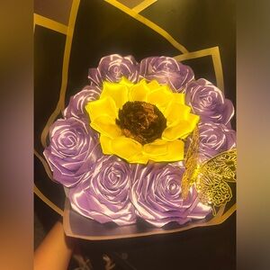 I am selling this eternal rose boquet with sun flowers!